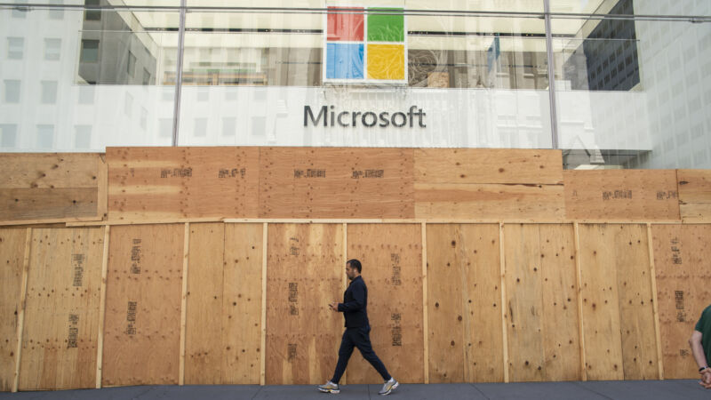 Ironically, this boarded-up Microsoft Store location in New York City, seen on June 8, is one of the four in the world that <em>will</em> reopen—but as an "experience center" where you can't buy anything.