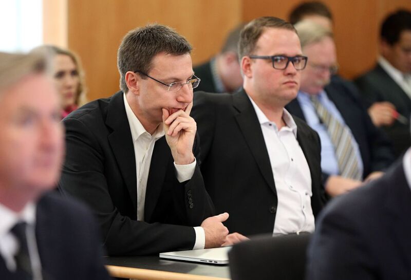 Megaupload executives Mathias Ortmann (L) and Bram van der Kolk (R) are seen in court during an extradition hearing in Auckland on September 24, 2015.